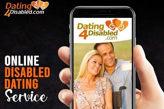 A smartphone appears with a white couple on the screen, including a woman sitting in a wheelchair. The text reads "Dating4Disabled. com Online Disabled Dating Service"